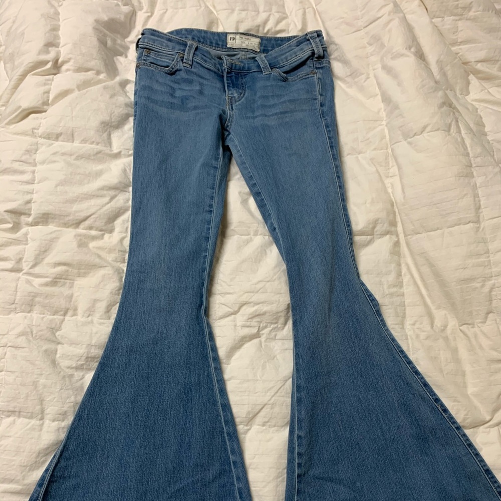 Free People bell bottom raw edge jeans size 25